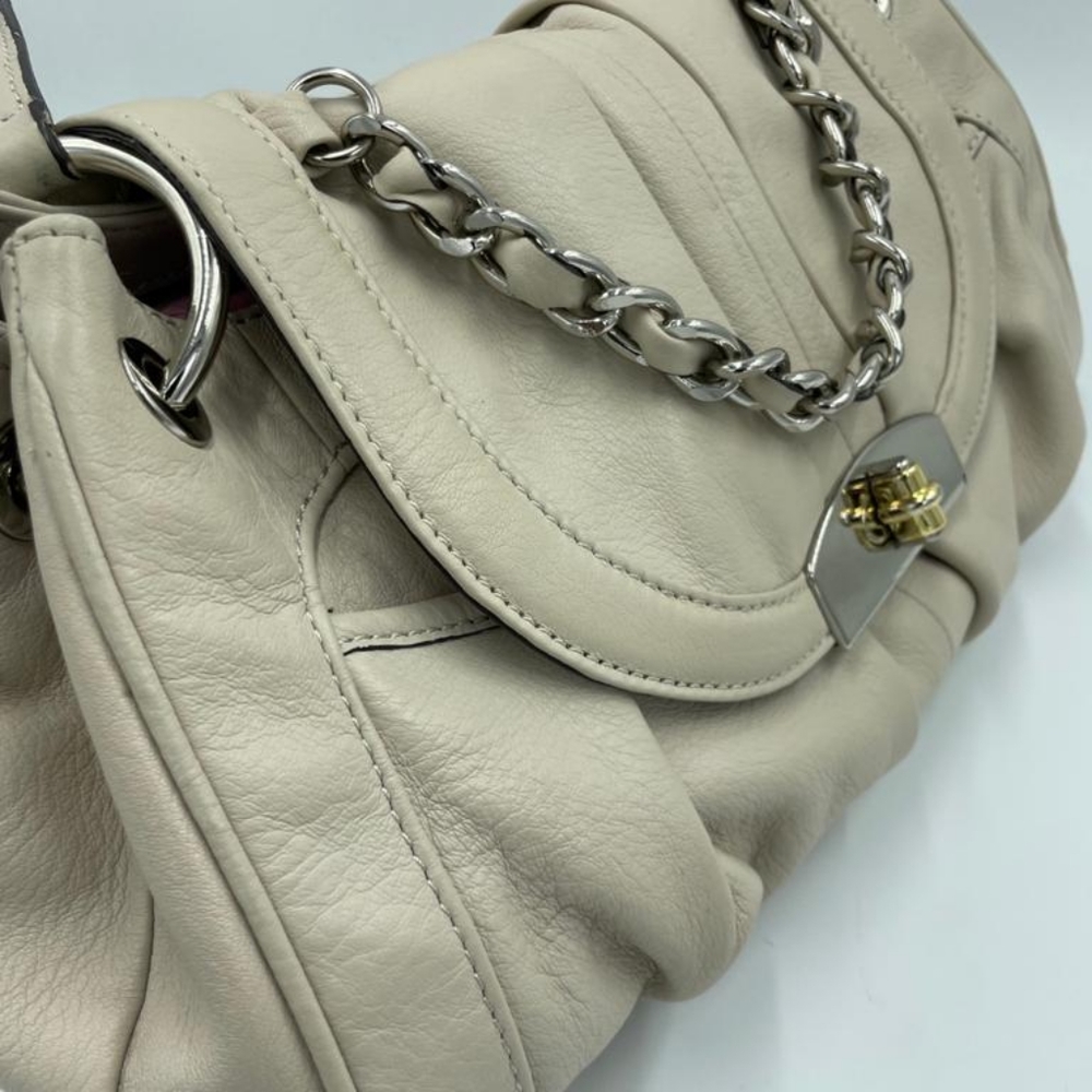 B. Makowsky With Dust Bag